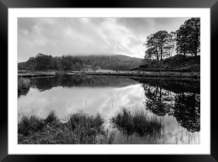 Dramatic sky and reflections on the River Brathay  Framed Mounted Print by Liam Grant