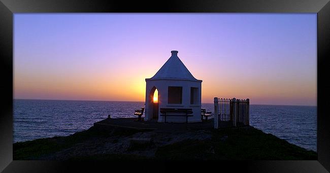 Sunset through the Arch. Framed Print by malcolm fish