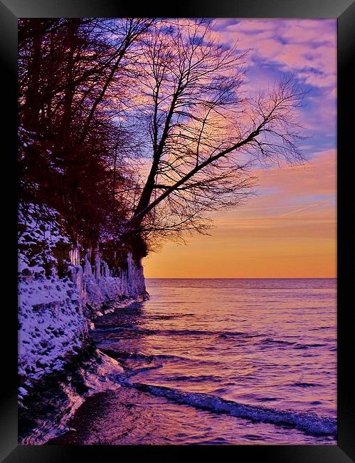 Lake Erie Winter Wash up. Framed Print by Jeffrey Evans