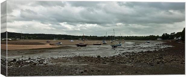 Red Wharf Bay Canvas Print by malcolm fish