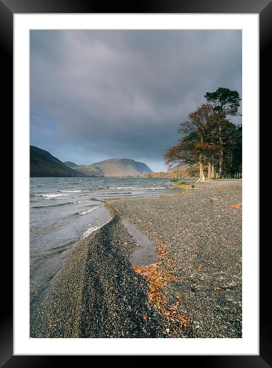 Sunlight on the shore of Buttermere. Framed Mounted Print by Liam Grant