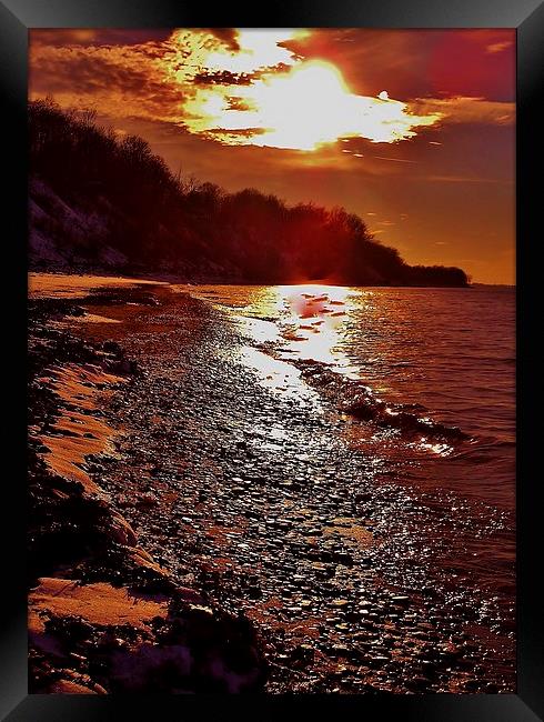Sunset on the Lake Framed Print by Jeffrey Evans