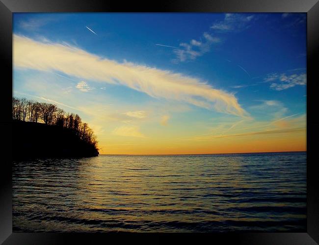 Sunset over Lake Erie Framed Print by Jeffrey Evans