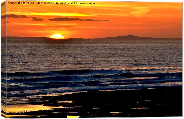 Sunset behind the Gower Peninsula Canvas Print by Paula J James