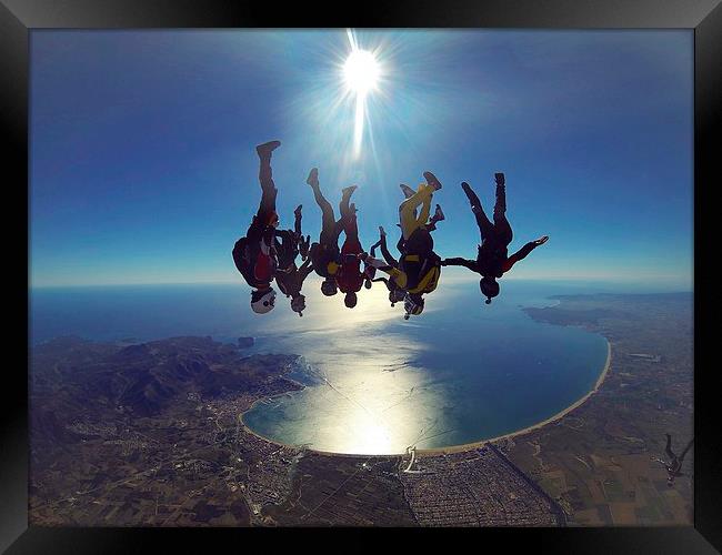 Skydive freefly over the bay Framed Print by Ewan Cowie