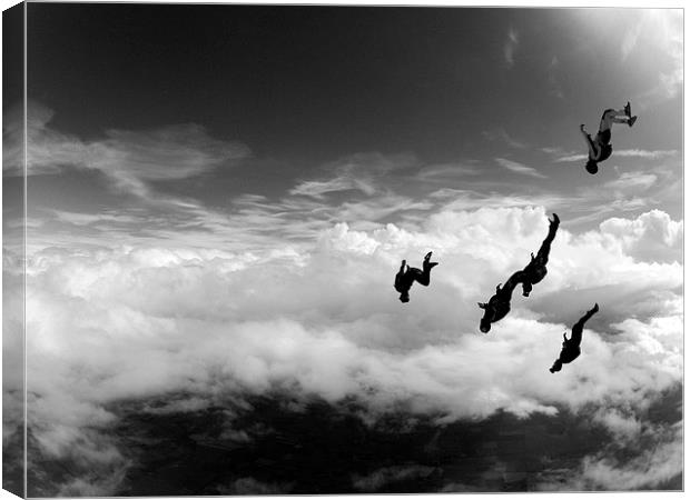 skydive in the clouds Canvas Print by Ewan Cowie