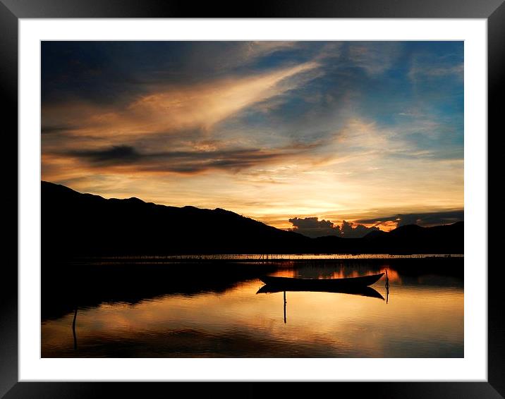 Vietnam sunset over the lagoon Framed Mounted Print by Ewan Cowie