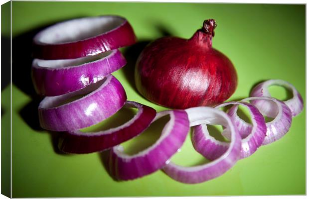Red onion slices Canvas Print by anna collins