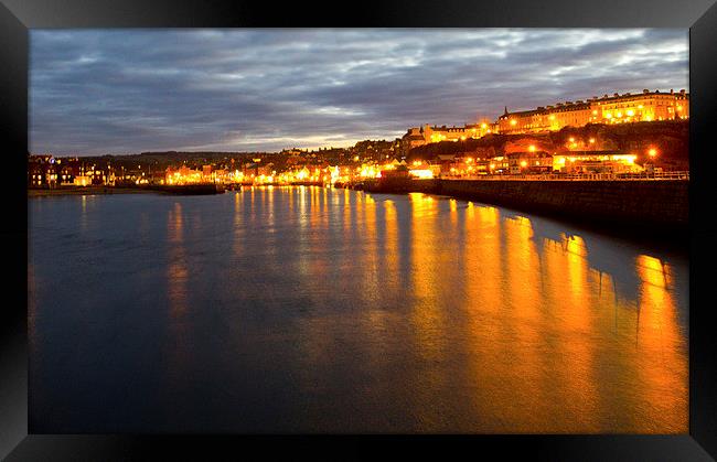 Whitby by night Framed Print by Colin Brittain