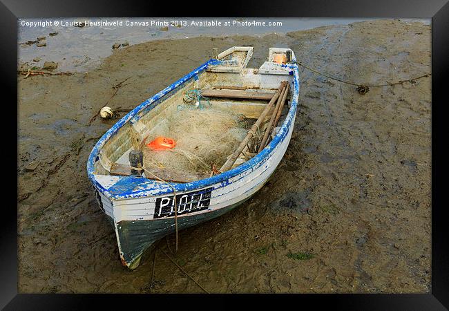 Fishing dinghy at low tide Framed Print by Louise Heusinkveld