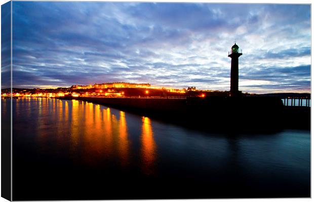 Whitby harbour by night Canvas Print by Colin Brittain