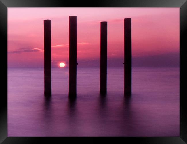 west pier sunset pillars Framed Print by Terry Busby