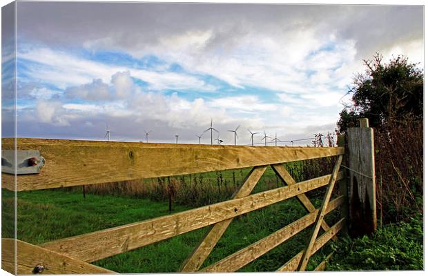 Somerton Church Gate Looking at Windturbines Canvas Print by James Taylor