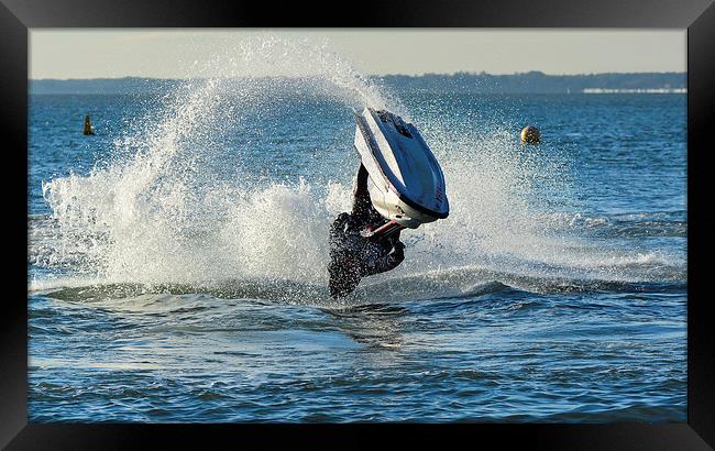 jet ski stunt on the water Framed Print by nick wastie