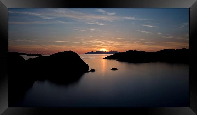 sunset over Eigg and Rum Framed Print by Dan Ward