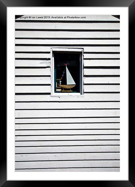 Model Boat In A Window Framed Mounted Print by Ian Lewis