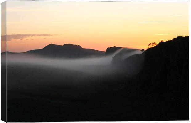 Dawn from Steel Rigg, Northumberland Canvas Print by Heather Athey
