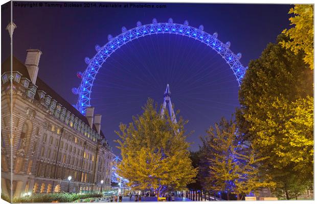 Illuminated London Eye Canvas Print by Tommy Dickson