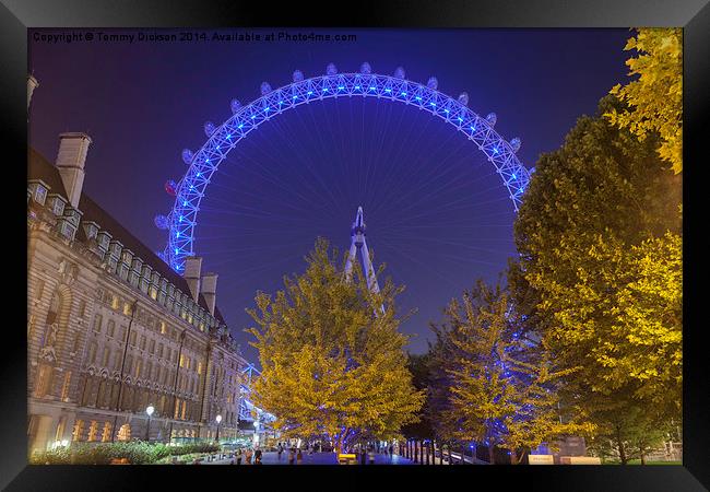 Illuminated London Eye Framed Print by Tommy Dickson