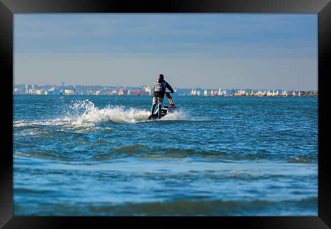 jet ski  on the water Framed Print by nick wastie