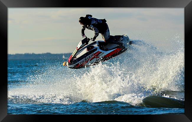 jet ski  on the water Framed Print by nick wastie
