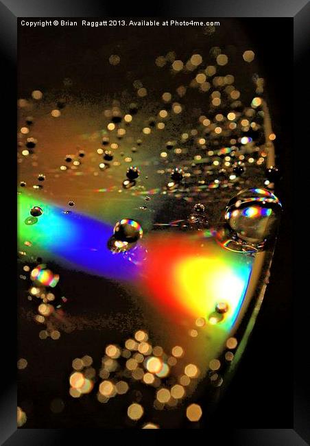 Water Drop Disc- Glow Framed Print by Brian  Raggatt