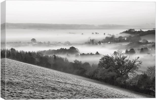 Bradninch in the Mist Canvas Print by Pete Hemington