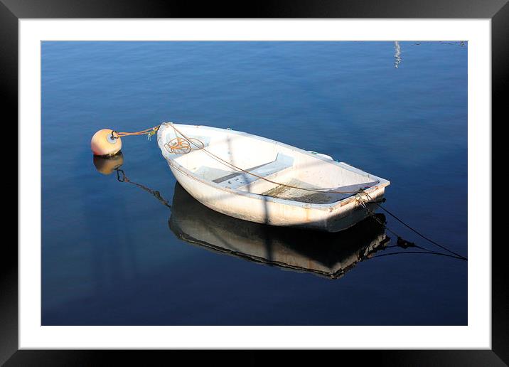 Boat waiting in the harbour Framed Mounted Print by Poppy Allen