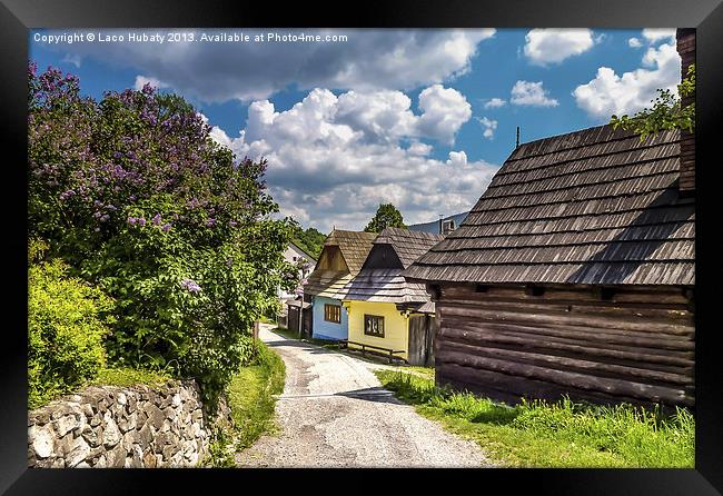 Street in the Vlkolinec village,Slovakia Framed Print by Laco Hubaty