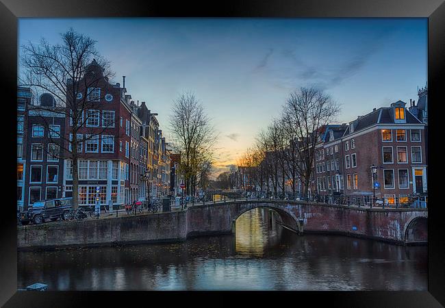 Twilight in Amsterdam Framed Print by Ann Garrett
