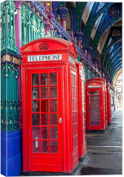 Red Telephone Boxes Canvas Print by Philip Pound