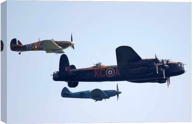 World War Two fly past Canvas Print by Paul Nicholas