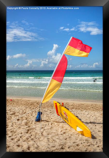 Lifeguards Flag and Surfboard Framed Print by Paula Connelly