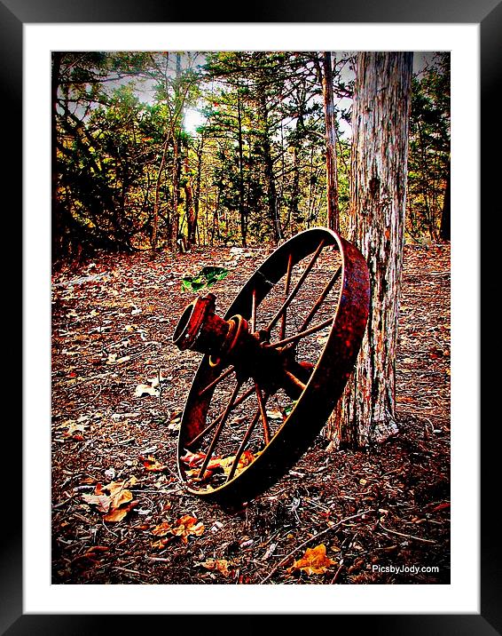 Rusty Wheel Framed Mounted Print by Pics by Jody Adams
