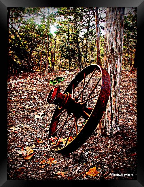 Rusty Wheel Framed Print by Pics by Jody Adams