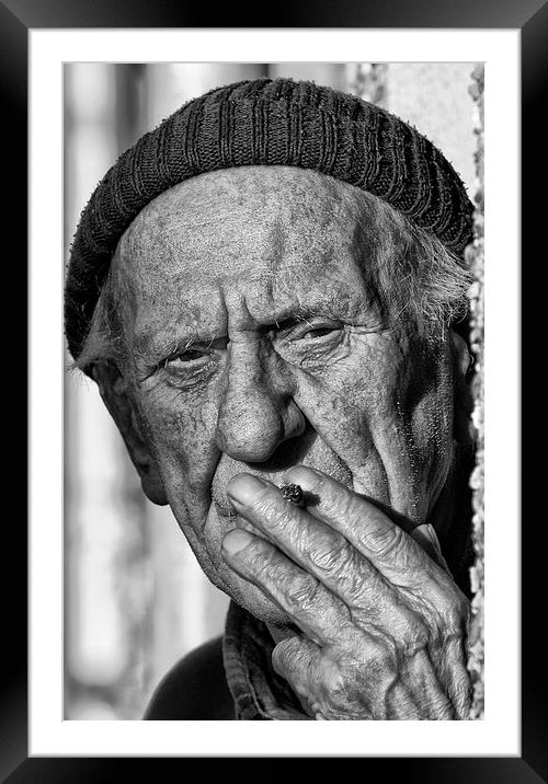 Man having a cigarette Framed Mounted Print by Rory Trappe