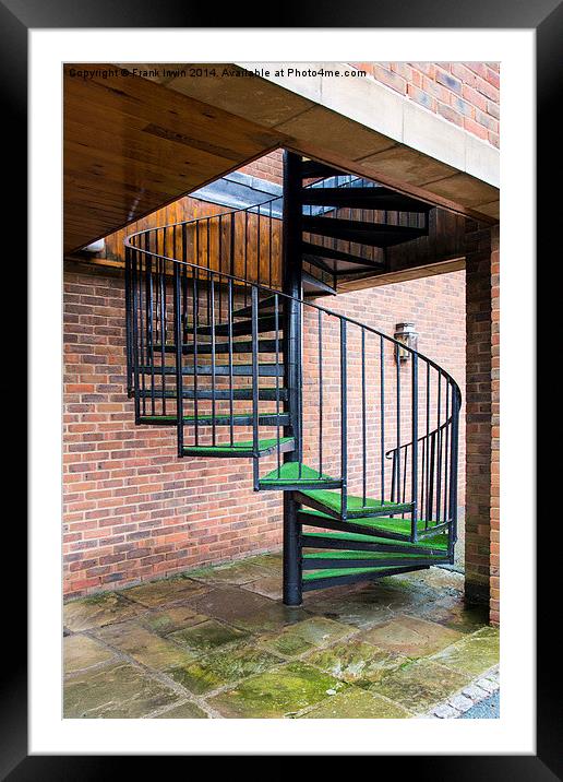 A spiral staircase used as a fire escape. Framed Mounted Print by Frank Irwin
