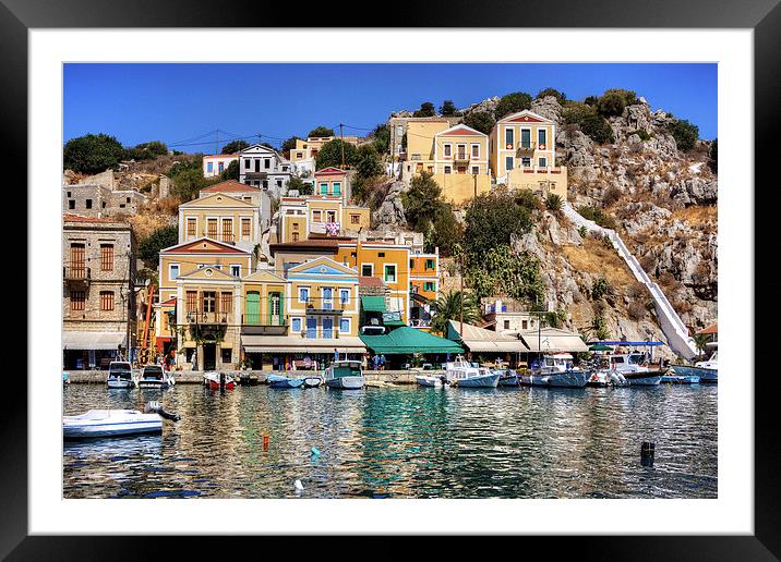 Houses on the rocks Framed Mounted Print by Tom Gomez