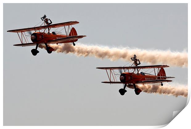 Biplane wingwalkers Print by Paul Nicholas