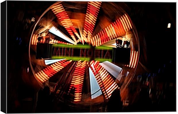 Ferris wheel at full speed 2 Canvas Print by Jose Manuel Espigares Garc