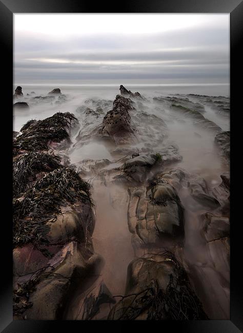Misty Rocks on Sandymouth Framed Print by Mike Gorton