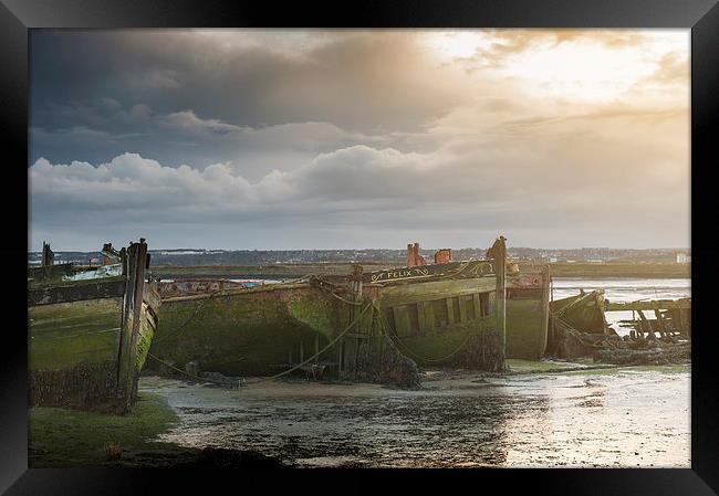 Medway Wrecks Framed Print by James Rowland
