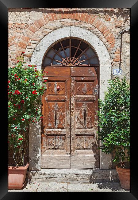 Antiquated Tuscan doorway Framed Print by Ian Duffield