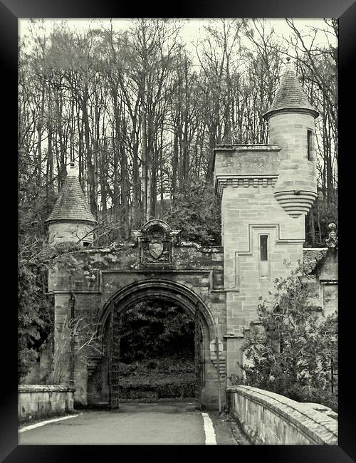 Gatehouse and turrets Framed Print by Bill Lighterness