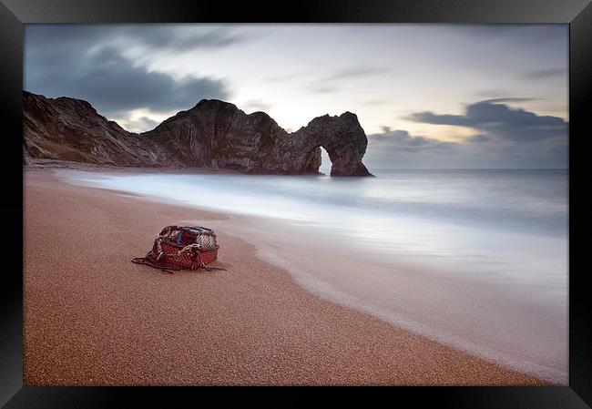 Lost Property at Durdle Door Framed Print by Chris Frost