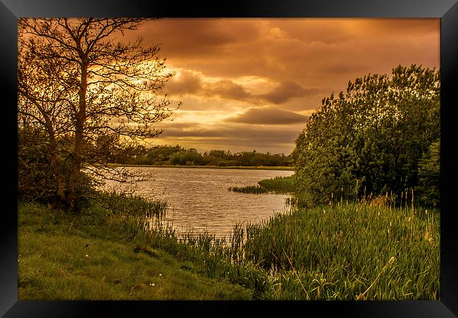 Big Waters Sunset Framed Print by John Ellis