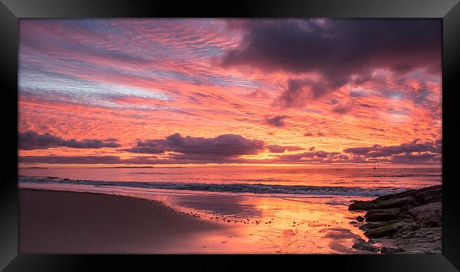 Across the bay at sunrise Framed Print by Phil Wareham