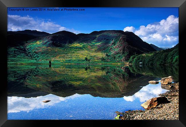 Llyn Dinas Reflections Framed Print by Ian Lewis