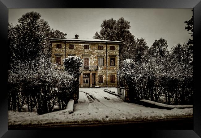 Old country house with snow Framed Print by Guido Parmiggiani