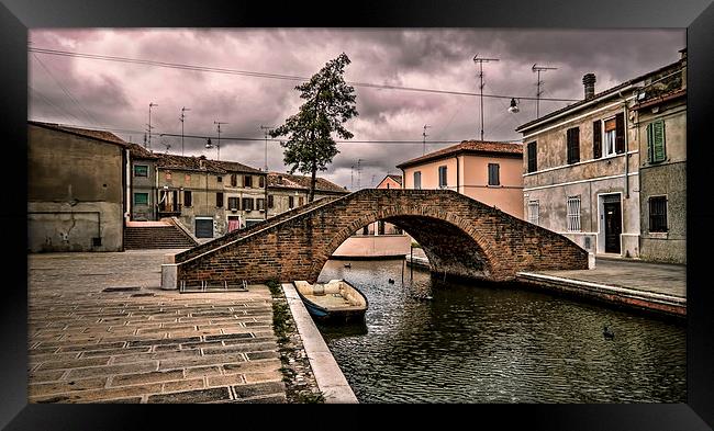 The Carmine bridge in Comacchio Italy Framed Print by Guido Parmiggiani